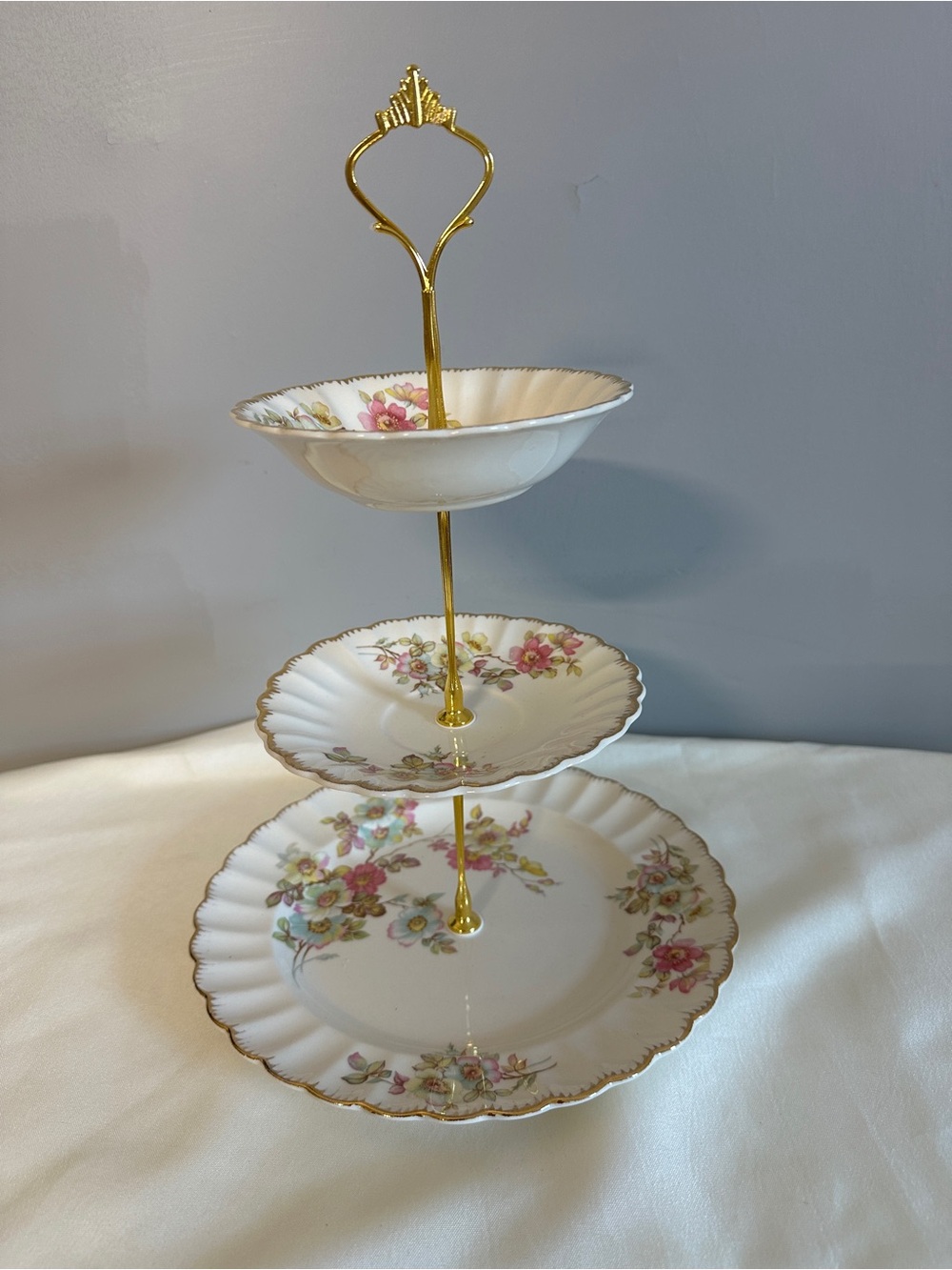 Three-Tier Porcelain Serving Stand with Pink Floral Pattern and Gold Trim